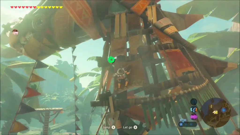 Link climbing the wooden horse-head tower