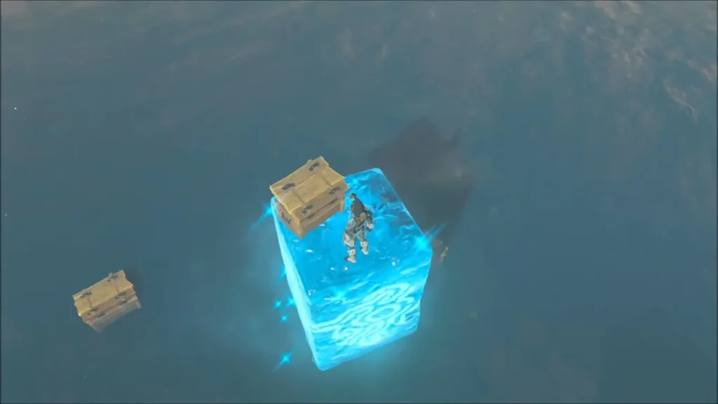 Link on a Cryonis block beside crates floating in the lake