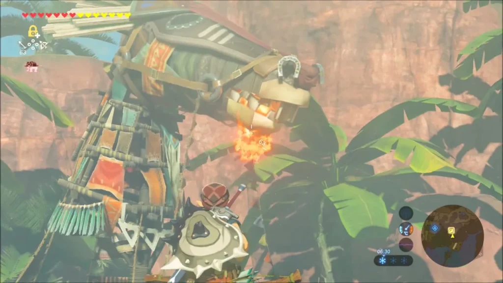 A fire arrow burning in the open mouth of the horse-head tower