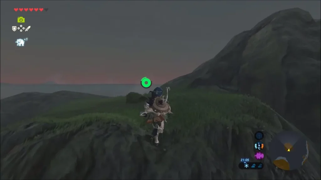 Link on a grassy islet out on the dark water at dusk
