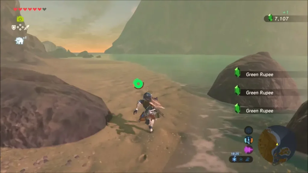 Link picking up three Green Rupees on the sandy beach