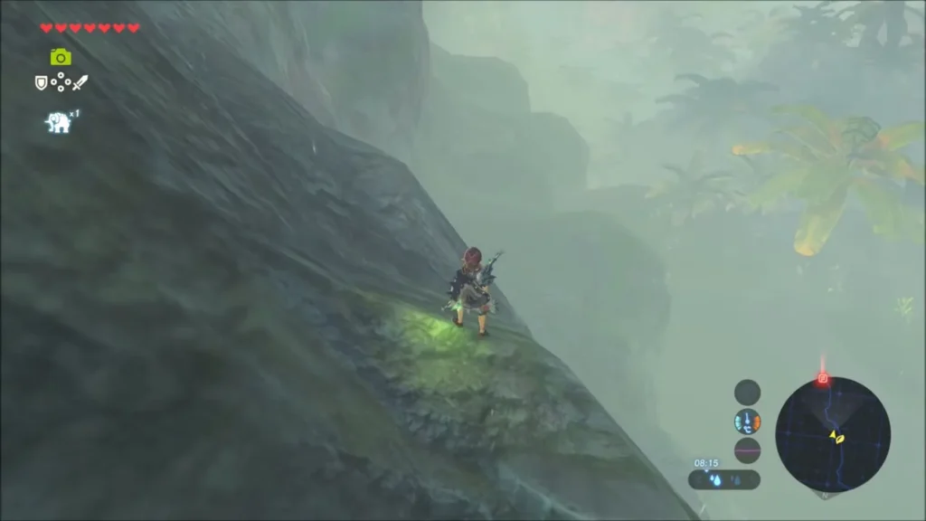 Link climbing a steep mossy cliff face in the fog