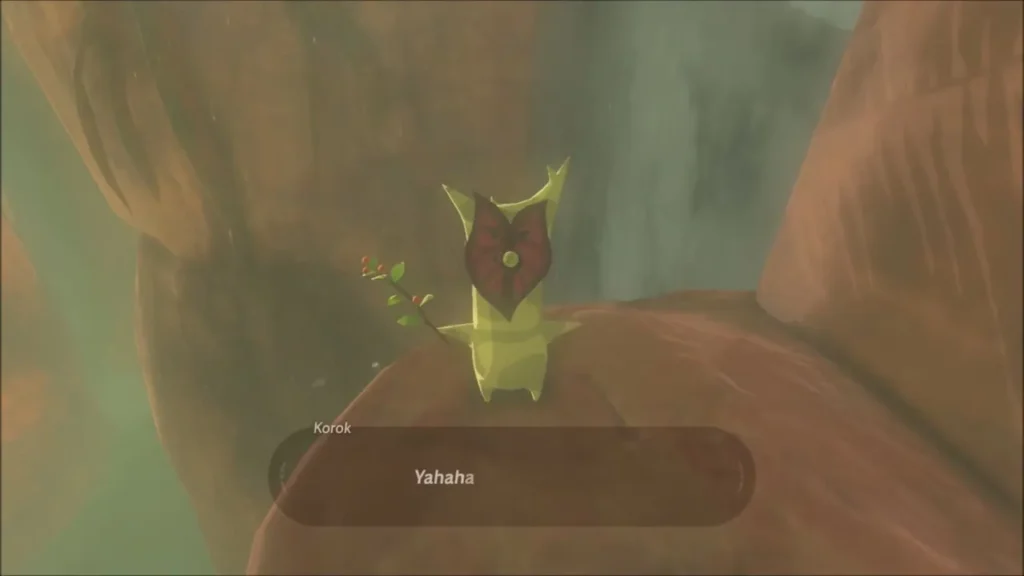 A Korok waiting at the end of the narrow cliff ledge