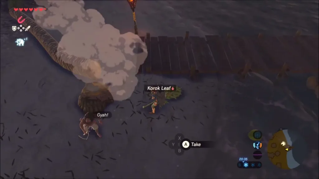 Link at the shore about to take a Korok Leaf