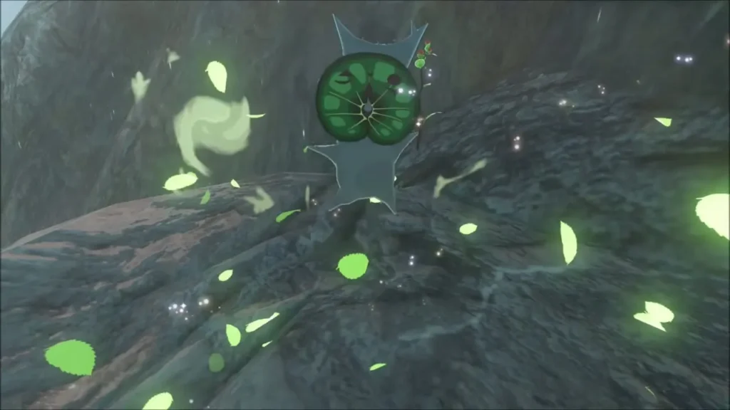 A Korok on a rocky ledge amid swirling green leaves