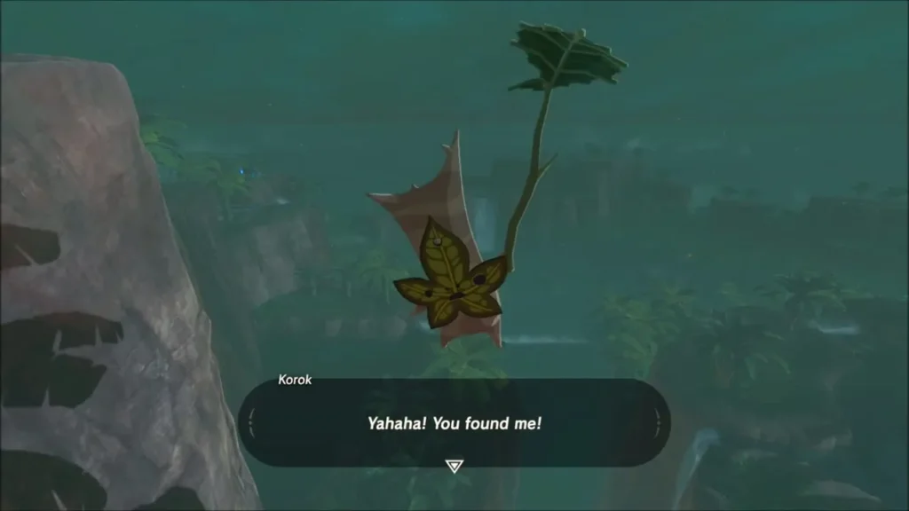 A Korok hanging in the air saying Yahaha, you found me, by the waterfall