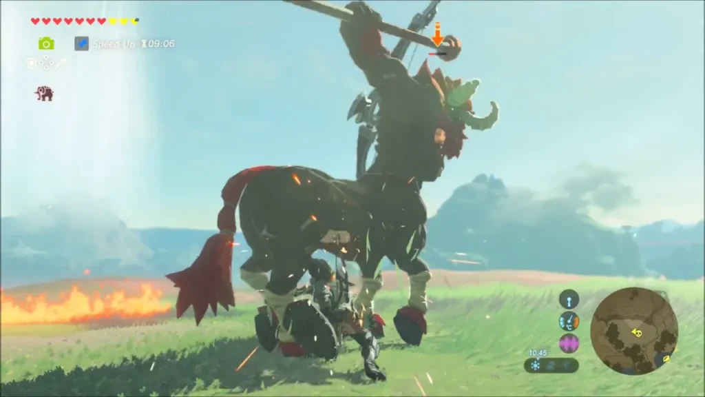 A Lynel rearing up near burning grass