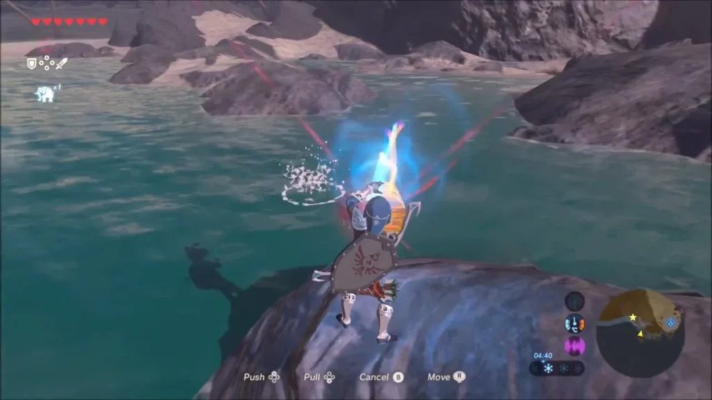 Link using Magnesis from a rock to pull a chest through the water
