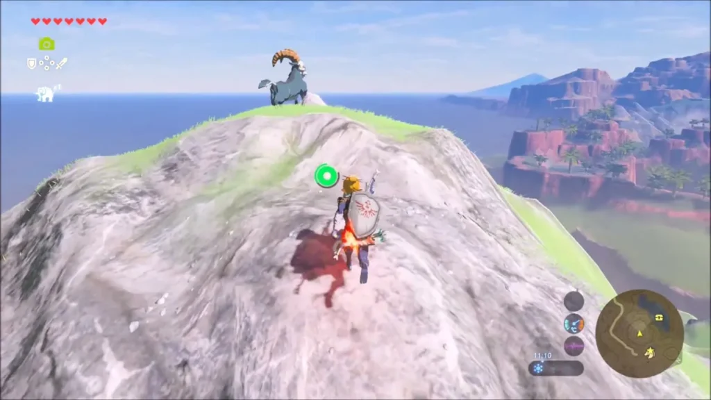 Link nearing the peak with the rock on top