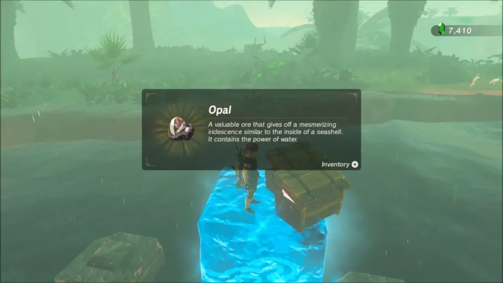 Opal item box with Link on an ice block beside an opened chest