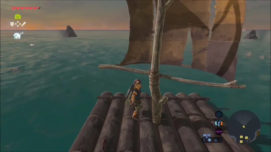 Link standing on the sail raft at sunset out at sea