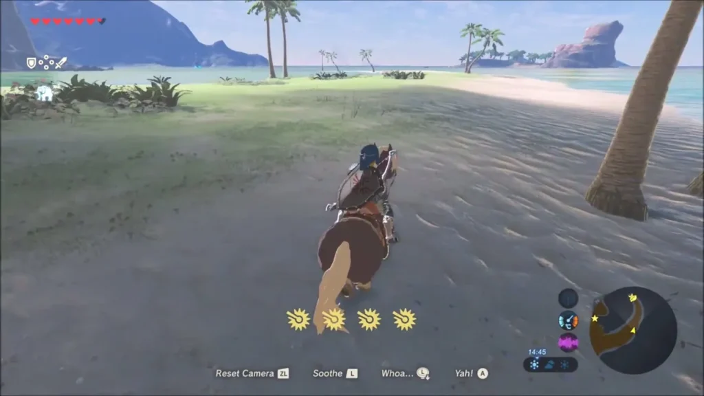 Link riding a horse along a sandy beach lined with palm trees