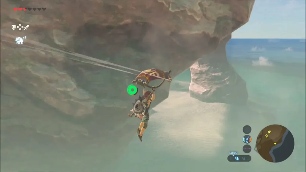 Link gliding down toward the stone sea arch over the sand