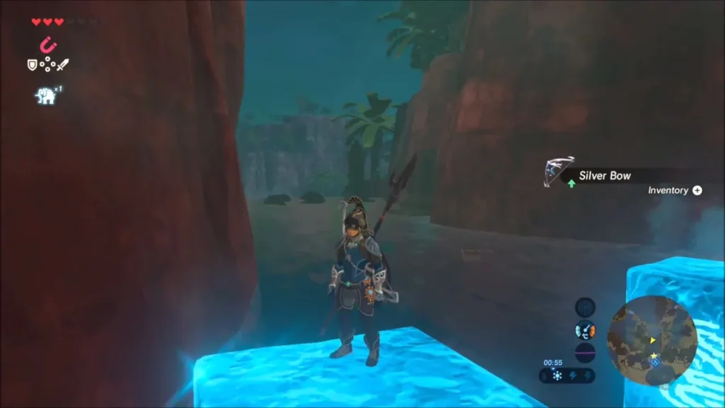 Link on an ice block in the gorge with the Silver Bow pickup