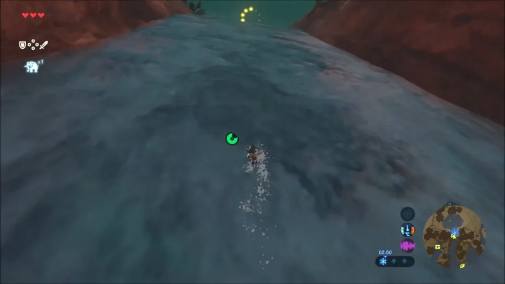 Link swimming down the current toward the lip of the waterfall