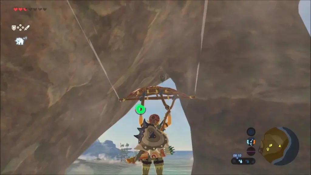 Link gliding in beneath the underside of the rock arch