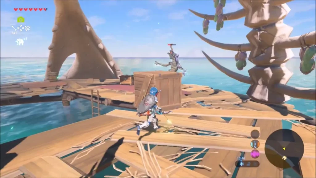 Link on the planks of the wrecked raft next to a crate and a Bokoblin