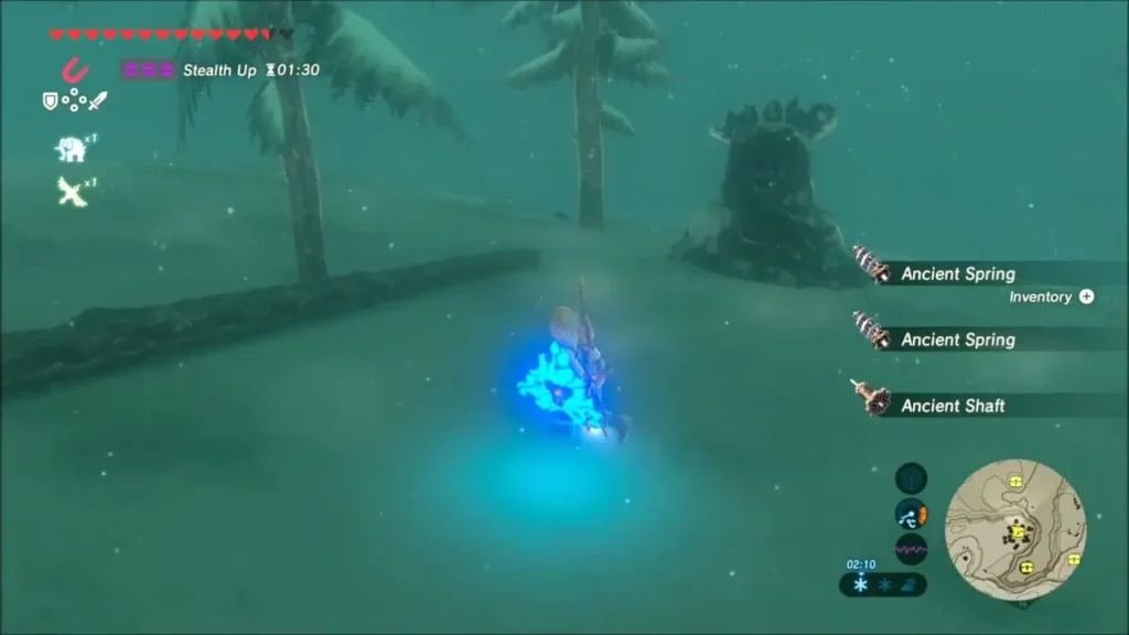 Link picking up Ancient Springs and an Ancient Shaft beside a fallen tree Link picking up Ancient Springs and an Ancient Shaft beside a fallen tree