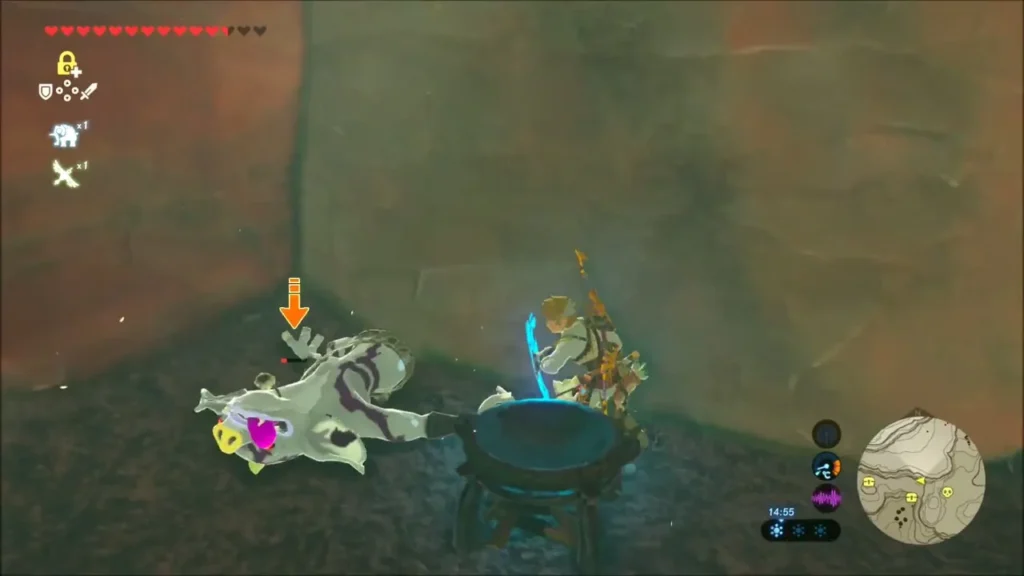 Link beside a lit campfire next to a defeated Moblin Link beside a lit campfire next to a defeated Moblin