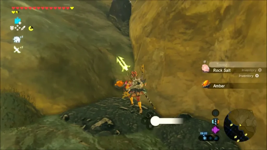 Link mining ore in the canyon wall with Amber and Rock Salt pickups showing Link mining ore in the canyon wall with Amber and Rock Salt pickups showing