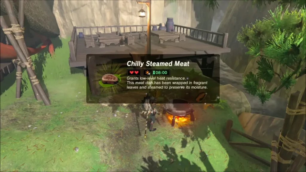 Link holding up a cooked Chilly Steamed Meat dish Link holding up a cooked Chilly Steamed Meat dish