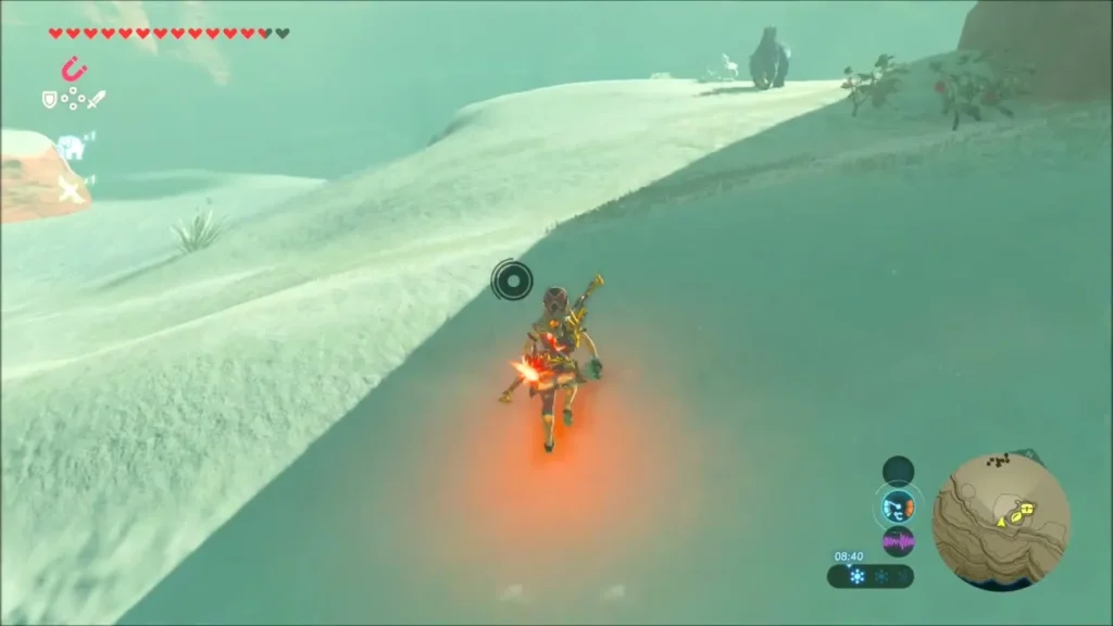 Link climbing a snow-covered slope toward the Risoka Snowfield Link climbing a snow-covered slope toward the Risoka Snowfield