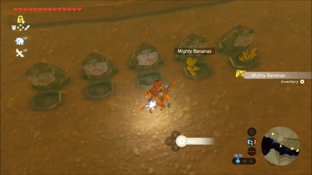 Link standing by stones and sockets with Mighty Bananas on one of them Link standing by stones and sockets with Mighty Bananas on one of them