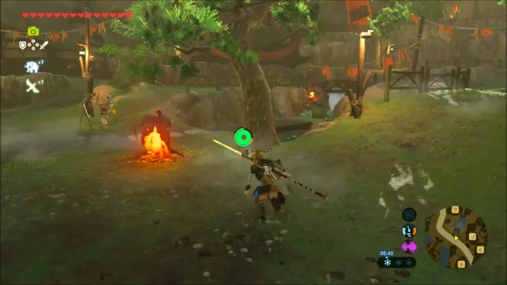 Link running past a campfire in Kakariko Village Link running past a campfire in Kakariko Village