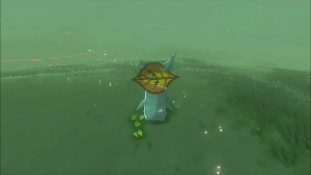 A Korok hiding in the open on the grassy hillside A Korok hiding in the open on the grassy hillside