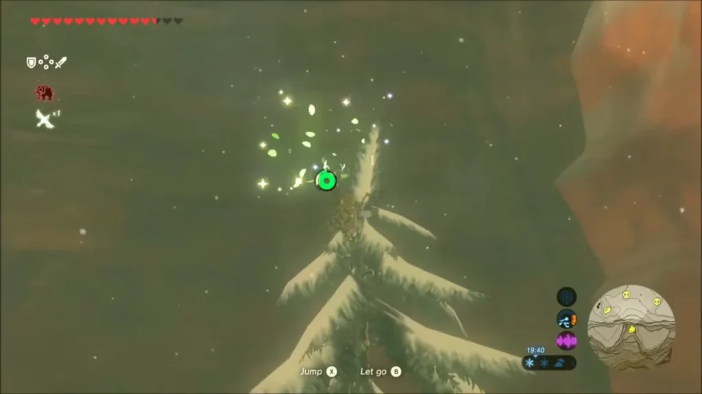 Green leaf sparkles near the crown of the snowy pine as Link nears the top Green leaf sparkles near the crown of the snowy pine as Link nears the top