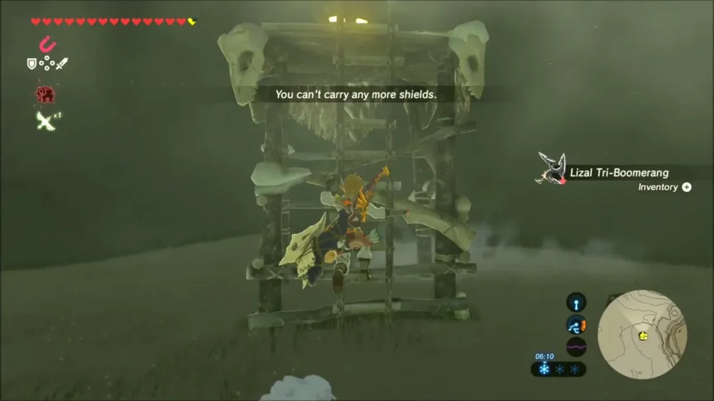 Link climbing the lookout after taking the Lizal Tri-Boomerang Link climbing the lookout after taking the Lizal Tri-Boomerang