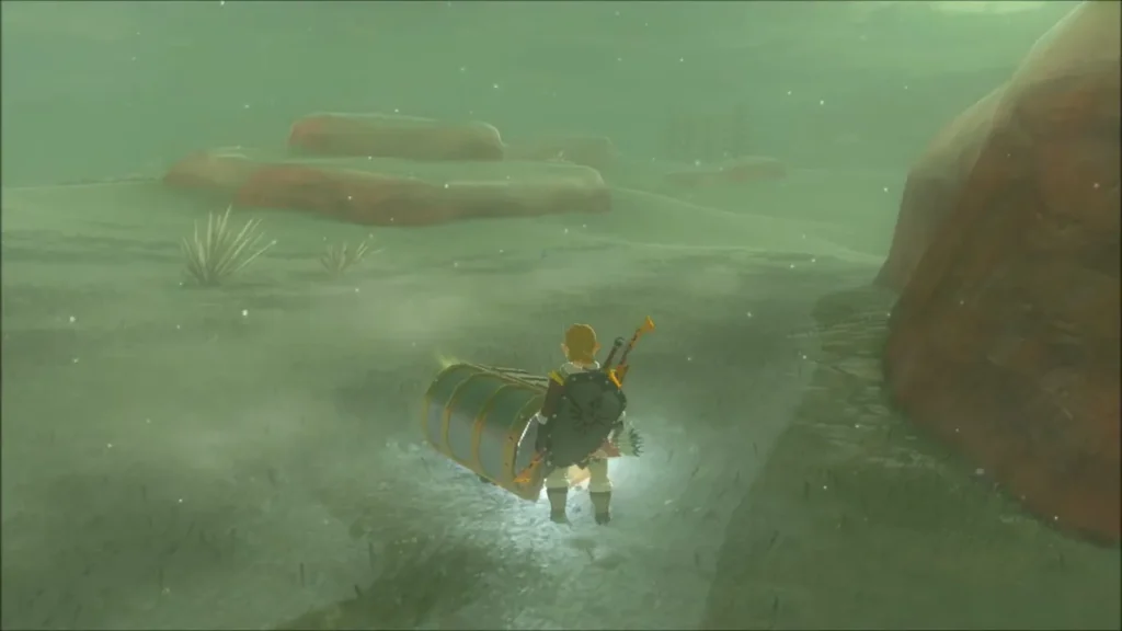 Link dragging a chest across the snowy ground with Magnesis Link dragging a chest across the snowy ground with Magnesis
