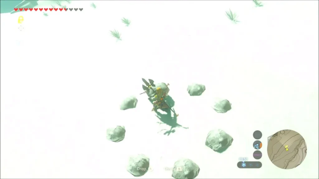 Link on top among a ring of small stones Link on top among a ring of small stones