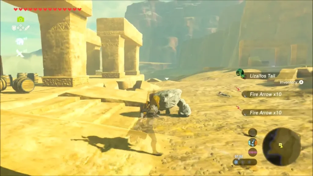 Link near tall sandstone pillars as Fire Arrows are picked up Link near tall sandstone pillars as Fire Arrows are picked up