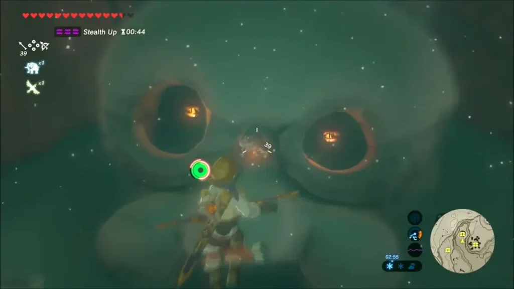 Giant skull-shaped Bokoblin camp seen from above as Link glides in Giant skull-shaped Bokoblin camp seen from above as Link glides in