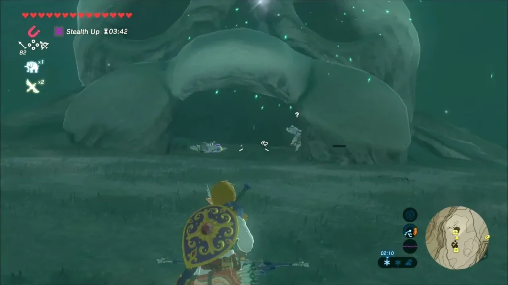 Link approaching the huge skull entrance of a Bokoblin camp at night Link approaching the huge skull entrance of a Bokoblin camp at night