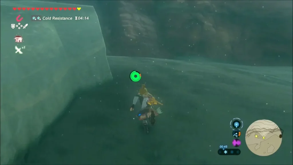 Link riding through blowing snow below a ridge toward the shrine Link riding through blowing snow below a ridge toward the shrine