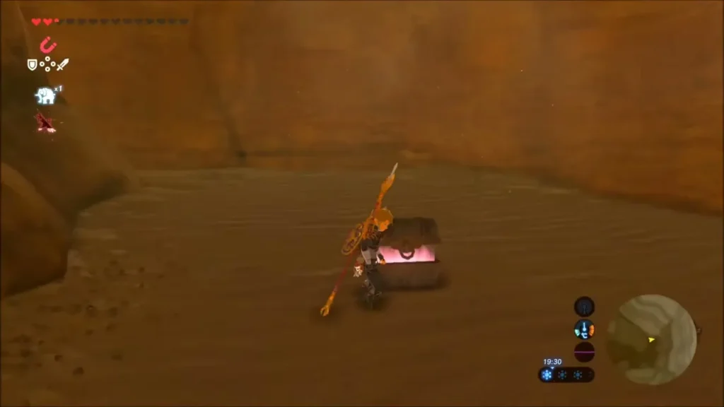 Link opening a chest dug out of the sand in the gully Link opening a chest dug out of the sand in the gully