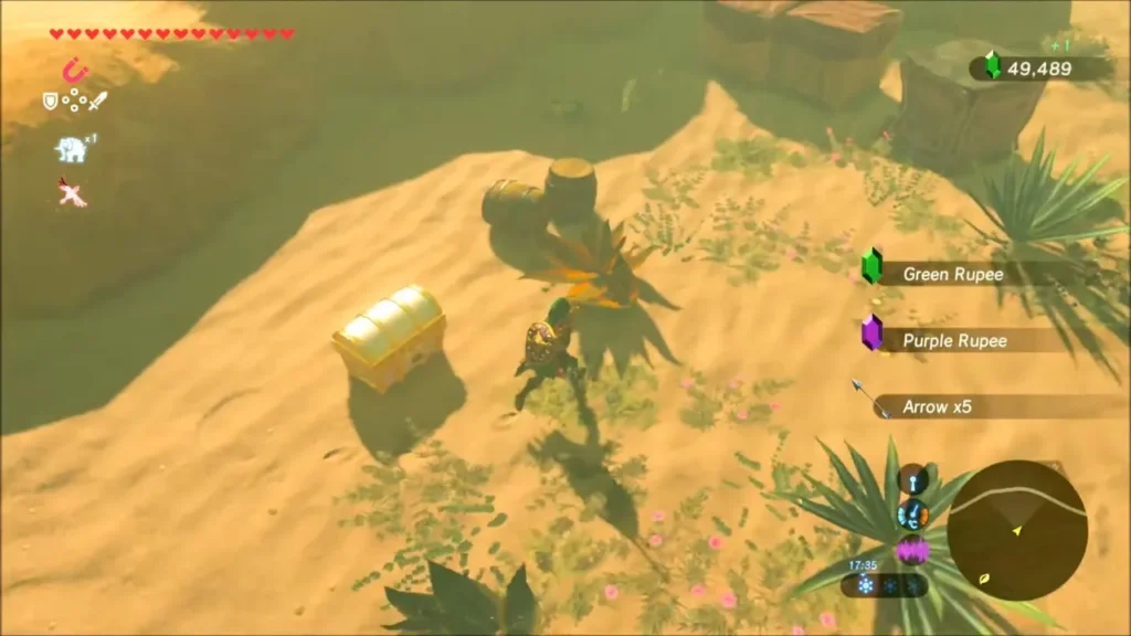 Loot list showing rupees and arrows after Link opens a chest at the camp Loot list showing rupees and arrows after Link opens a chest at the camp
