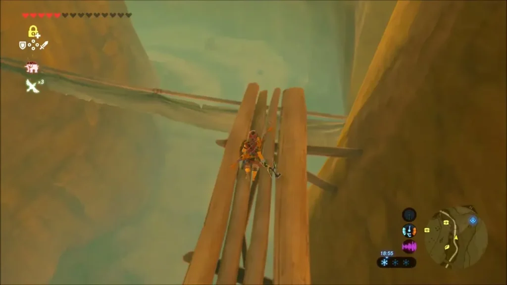 Link climbing a steep wooden plank walkway up the canyon wall Link climbing a steep wooden plank walkway up the canyon wall