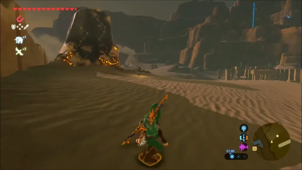 Link on the sand facing a glowing Sheikah shrine rising from the desert Link on the sand facing a glowing Sheikah shrine rising from the desert