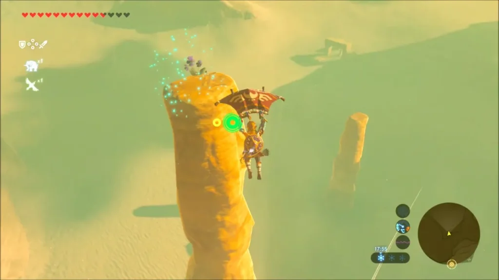 Link gliding up to the top of a tall sandstone rock pillar Link gliding up to the top of a tall sandstone rock pillar