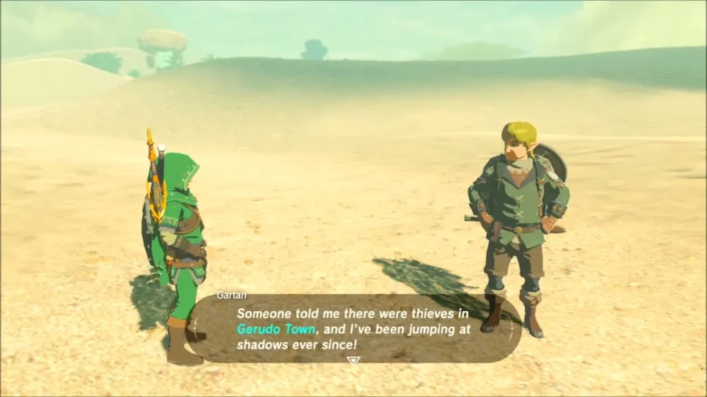 Gartan the roaming merchant talking to Link on the open desert sand Gartan the roaming merchant talking to Link on the open desert sand