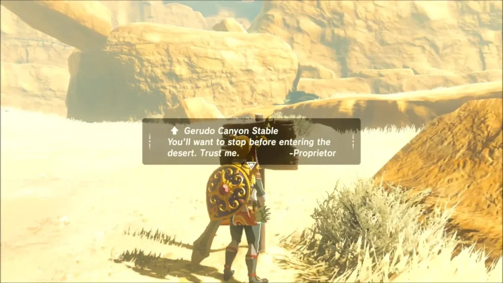 Link reading the Gerudo Canyon Stable signpost Link reading the Gerudo Canyon Stable signpost