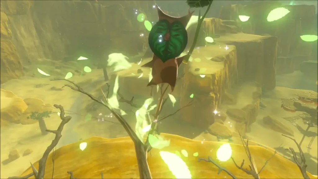 Korok among leaves on the canyon ledge as Link walks up Korok among leaves on the canyon ledge as Link walks up