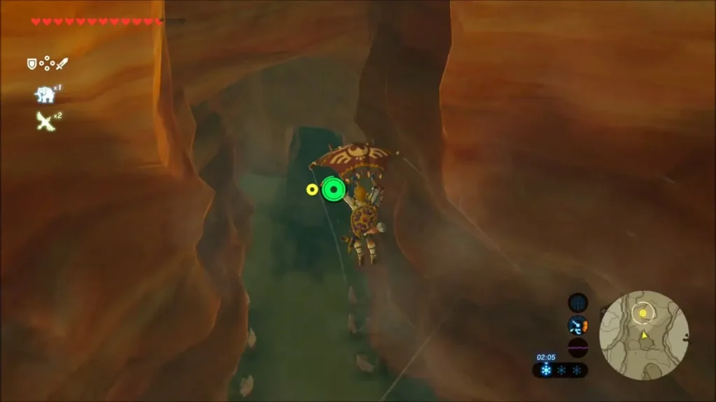 Link gliding down a narrow red canyon toward the hideout Link gliding down a narrow red canyon toward the hideout