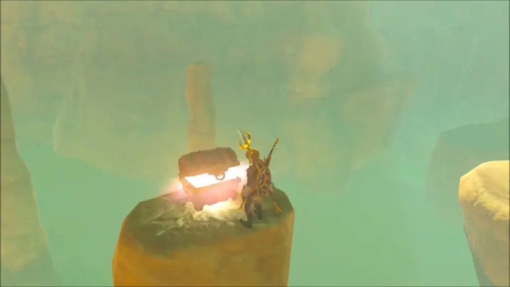 Link beside a glowing open chest on a lone rock pillar Link beside a glowing open chest on a lone rock pillar
