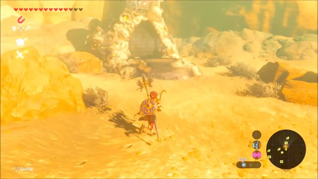 Link running across the desert sand toward the rock-carved Jee Noh Shrine Link running across the desert sand toward the rock-carved Jee Noh Shrine
