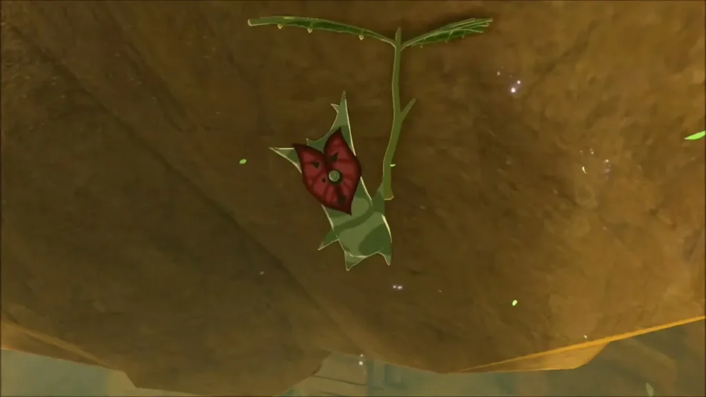 A Korok hiding on the underside of the rock face A Korok hiding on the underside of the rock face