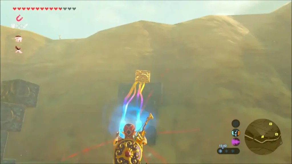Link using Magnesis to lift a metal block up a cliff face Link using Magnesis to lift a metal block up a cliff face